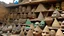 Placeholder: Pyramids filled with pottery and masks