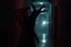 Placeholder: a sinister devil standing in a dark hallway