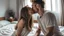 Placeholder: Couple in love kissing on the bedroom at home. Loving boyfriend and girlfriend sharing love together.