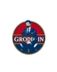 Placeholder: A circular logo with a vector of a groom in a suit at the top of the logo in a blue, red, white and gold color theme.