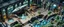 Placeholder: bitmap isometric big map of space ship invasion museum and dinosaur skeletons with different rooms fountains and canals and jungle train with plants and animals with transparent refractive glass monsters from d and d, 2 levels with stairs and pillars, realistic 3d, in style of escher and giger