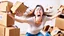 Placeholder: woman starts frantically tearing apart all the boxes and packaging