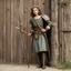 Placeholder: [high res photography by Ray Harryhausen] Joan:A farmer girl from Domremy, a village in medieval France, touched by a divine calling at a tender age. She presents all sorts of pole arms on a wooden wall: Spear Halberd Guisarme Partisan Bardiche Bec de Corbin Ranseur Voulge Bohemian earspoon Fauchard Lochaber