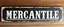 Placeholder: fill composition with large and wide hand painted old western sign that reads: "MERCANTILE" white on black with inset white stripe aged paint sanserif