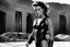 Placeholder: [photo by helmut newton in agent provocateur on the arena] Her complexion, after years spent training under the sun, bore the mark of a warrior who had weathered countless battles. Though her face spoke of hardship, there was also an air of grace and serenity that emanated from her every pore. Selene's physique was a testament to her dedication and discipline. Her muscular frame hinted at her physical prowess, yet her movements were fluid, as if she danced with the wind itself.