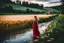 Placeholder: wide angle shot of golden wheat field next to river ,a watermill on river, a beautiful girl in pretty long dress walking in