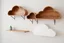 Placeholder: wall shelves made with brackets shaped like clouds