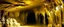 Placeholder: A golden melted cave designed in cave paintings painted by Salvador Dali