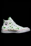 Placeholder: A red converse sneaker with weed leaves printed on the material, green, yellow and red colors