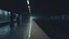 Placeholder: wpman in a minimal photo of empty dark outdoors train platform early in the morning with a feeling of a sense of discomfort or unease, often due to the emptiness or stillness in a dream-like style with no signs of life