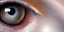 Placeholder: Medium shot of a human eye that contains a universe a