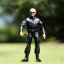 Placeholder: G.i. Joe Biden toy doll airforce flightsuit plastic face plastic hair sunglasses with black boots full body in package with gun 2022