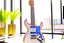 Placeholder: A lovely clear transparent resin guitar with forget-me-not design in a modern room in sunshine