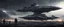 Placeholder: photorealistic. its a dark night. A man and his son are watching, holding hands. A huge spaceship is slowly moving 100 metres above the ground in the distance. It's a hyper futuristic chrome studded battleship. its many turrets are glowing. Its menacing arrow-like shape is damaged. a number of smaller fighter craft are circling in a protective pattern. the ground is strewn craters and the remains of a bombed out city. explosions are visible in the distance.