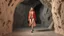 Placeholder: the model walks in cave as a fashion show presenter and magically her clothing changes several times,3d structures of cave evolve and animate to create pretty visuals