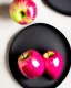 Placeholder: Pink Apple and red pear on a black dish