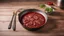 Placeholder: red beef pan on a wooden surface in the kitchen