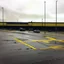 Placeholder: Minimal abstract oil paintings desolate 1960s carpark concrete fragments. Yellow road markings. style of Justin Mortimer and Francis Bacon.