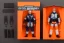 Placeholder: Mike Pence G.I. Joe toy action figure Space force uniform With Extra accessories inside a blister packaging hanging on a Wallrack in toystore, fluorescent orange, toy guns, wide angle shot whole body, black moonboots, fullsize