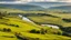 Placeholder: View across the valley in the Yorkshire Dales with beautiful clouds, late afternoon sunshine, stone walls enclosing the fields, gentle hills and valleys, river, calm, peaceful, tranquil, beautiful composition