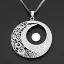 Placeholder: necklace with a simple, elegant design featuring a single, shimmering polyester in moon pendant