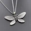 Placeholder: necklace with a simple, elegant design featuring a single, shimmering polyester in dragonfly pendant