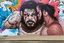 Placeholder: a wrestling graffiti mural wall