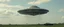 Placeholder: this stupid ufo aint real, it was created with some hoaxster with some serious self esteem problems, but its sucking up cars, poor people, so they levitate