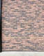 Placeholder: A brick wall with a black theme
