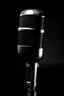 Placeholder: Black Microphone with the letter J beside it