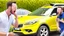 Placeholder: guy arguing on phone next to his kia sportage made out of lemons