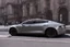 Placeholder: A Tesla 'Model Y' is drifting at high speeds, near the 'Central Synagogue' in New York City. (CINEMATIC, WIDE ANGLE LENS, PHOTO REAL)