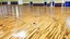 Placeholder: lady dirties wood floor in public fitness center