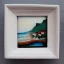 Placeholder: tiny oil painting of tiny seaside village, plain white background, solid white background, tiny white canvas, tiny white frame, melancholy, tender, moody, vintage, delicate arrangement, beautiful composition, etsy, aesthetic layout, plain solid white background