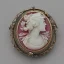 Placeholder: beautiful decorative cameo brooch with a kingfisher, decorative design, classical ornament, bilateral symmetry, highly detailed etching, marble carving