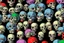 Placeholder: hundreds of non-anatomically correct, dark comic art, graphic novel,human skulls stacked into a wall unusual neon lighting, high velocity, 64k, dystopian, vray, a picture of a dark, comedic, anatomically correct wall of colorful tightly packed skulls of varying sizes and expressions, photo realistic, insanely meticulous, highly detailed, part of a collection of bones on display, 64k, dystopian, vray , ALL DRAWN IN THIN LINES OF NEON LIGHT AND COLORS