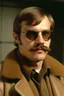 Placeholder: Jeffrey Dahmer in a brown coat with a mustache and sunglasses