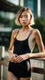 Placeholder: beautiful anorexic asian girl, total shot, shiny black triathlon swimsuit, short blond wavy bob hair, blurred city background