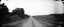 Placeholder: old wester railroad a dirt road , grayscale, antique pinhole photo