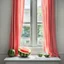 Placeholder: An open white window with watermelon colored curtains and a melon on the windowsill