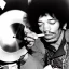 Placeholder: Jimi Hendrix at a turntable with headphones on being a DJ, cigarette in mouth