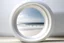 Placeholder: white,background,looking,through,a 3-d, hole,or,window,,a,seeing,paraddise,beach ,skulpture,like