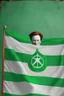 Placeholder: Conan O'Brien "Esperanto flag in background". Green-flag-with-white-star. Green flag in background