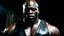 Placeholder: Adewale Akinnuoye-Agbaje x morris cheshunt as a handsome dark skinned and muscular heavy set man with a bald head and neatly trimmed beard. he is wearing a leather waistcoat and no shirt. he has a gold earing in his left ear. he has a angry expression on his face standing in a dungeon dark fantasy