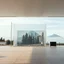 Placeholder: A super high definition photo of an open space with structures and a large computer screen. A transparent tarpaulin covers an image resembling a ruined building. There is a group of fir trees in the background and a high hill in the distance. The surface below is in a pastel color. Fog is present.