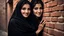 Placeholder: Hyper Realistic Photographic View Of a Beautiful Young Pashto Woman With Beautiful Eyes (& Eye Brows) & Beautiful Hands, & She Wearing Black Dress & Black Dupatta With Her Peeking-Half-Faced From A Brick-Wall Giving Bold Smile & Bold Expressions Putting Her That Hand On That-Brick-Wall At Dark Night Showing Dramatic & Cinematic Ambiance.