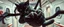 Placeholder: gritty air brush 3d with pen outline, vampire space loab spider panther cat holding a human in its grip, pin hole cam in doll house space ship hospital corridor, in the style of HR GIGER, ESCHER, motion blur background