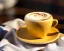 Placeholder: Cappuccino art microfoam in yellow mug saucer Crawford plaid napkin Demitasse