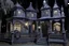 Placeholder: A grayish violet haunted mansion with Jack-o'-lanterns and ghosts designed in Javanese shadow puppets