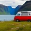 Placeholder: A Campervan is parking in a norwegian Fjord